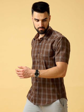 Brown And Cream Check half sleeve shirt shop online at Estilocus. DETAILS & CARE This pure cotton Checked shirt is a stylish go-to for laidback days. Cut in a comfy regular fit, with a classic button-down front and chest pocket. 100% premium cotton full s