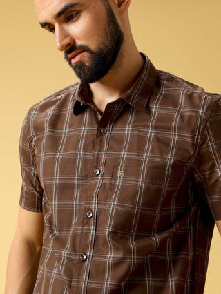 Brown And Cream Check half sleeve shirt shop online at Estilocus. DETAILS & CARE This pure cotton Checked shirt is a stylish go-to for laidback days. Cut in a comfy regular fit, with a classic button-down front and chest pocket. 100% premium cotton full s