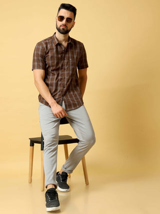 Brown And Cream Check half sleeve shirt shop online at Estilocus. DETAILS & CARE This pure cotton Checked shirt is a stylish go-to for laidback days. Cut in a comfy regular fit, with a classic button-down front and chest pocket. 100% premium cotton full s