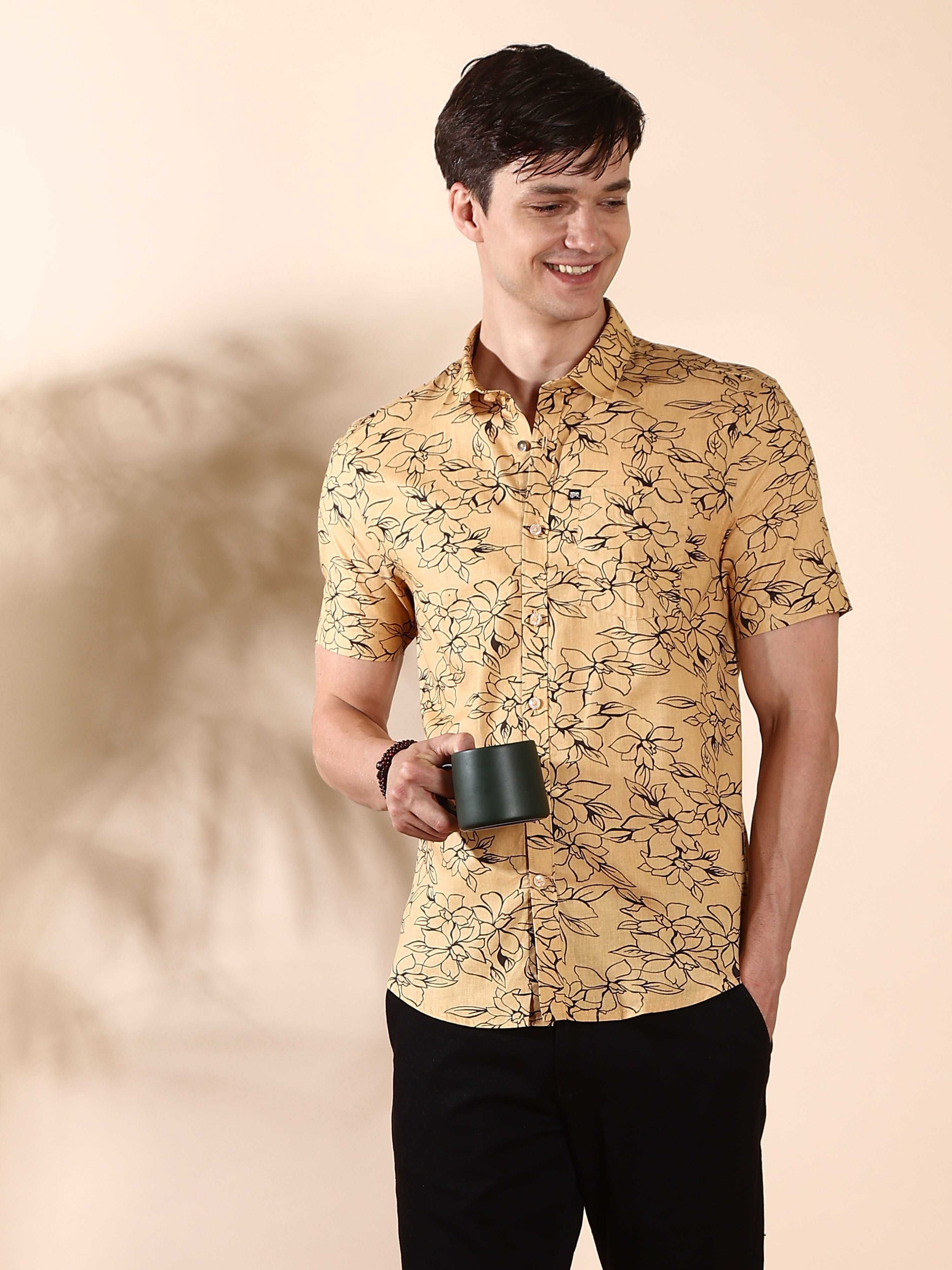 Beige casual floral AOP half sleeve shirt shop online at Estilocus. • Half-sleeve check shirt• Cut and sew placket• Regular collar• Single pocket with logo embroidery• Curved hemline• Finest quality sewing• Machine wash care• Suitable to wear with all typ