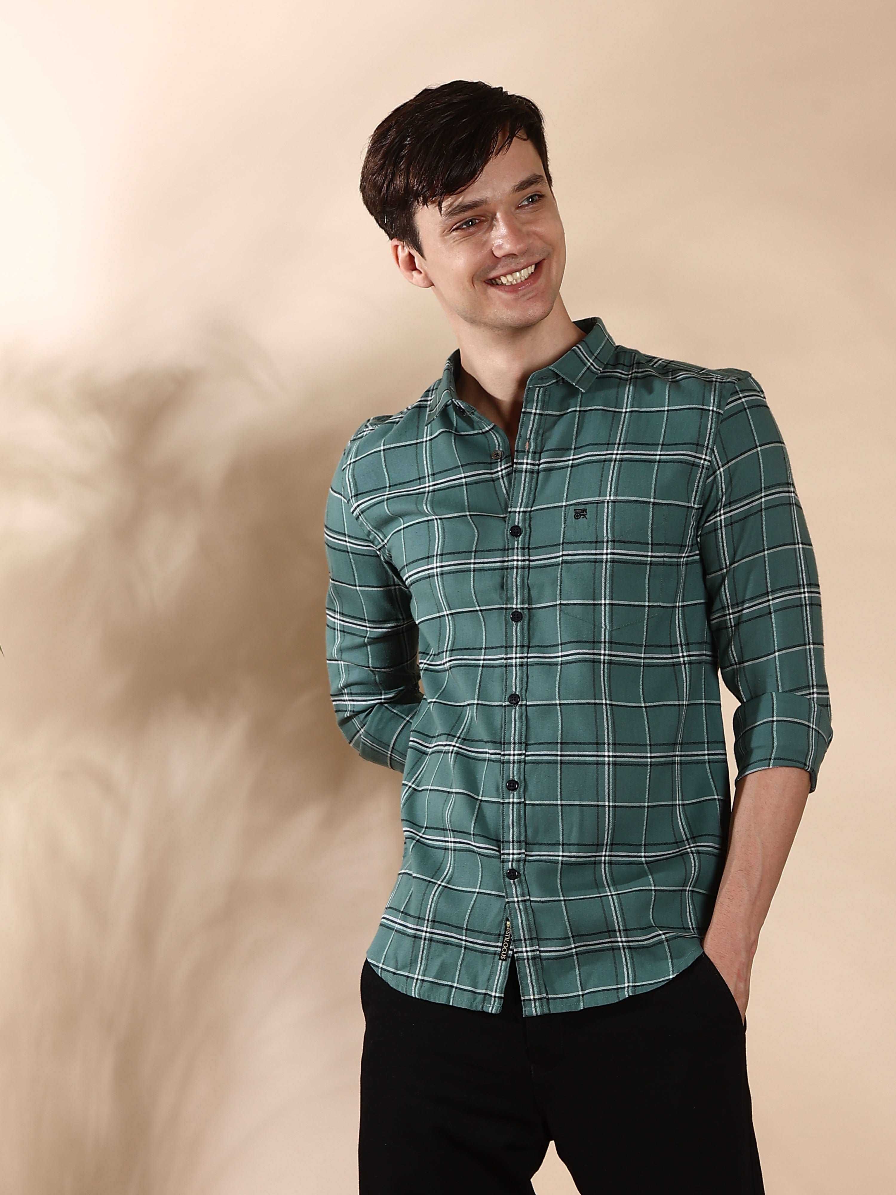 BR Green & Gray casual check full sleeve shirt shop online at Estilocus. • 100% PREMIUM COTTON • Full-sleeve solid shirt• Cut and sew placket• Regular collar• Double button square cuff.• Single pocket with logo embroidery• Curved hemline• Finest quality s