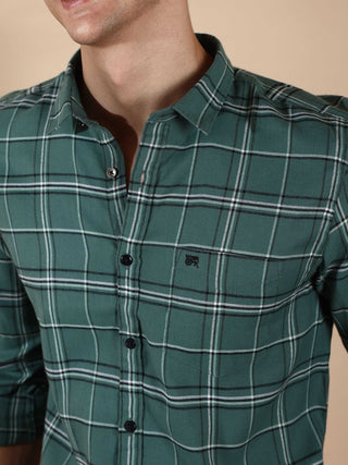 BR Green & Gray casual check full sleeve shirt shop online at Estilocus. • 100% PREMIUM COTTON • Full-sleeve solid shirt• Cut and sew placket• Regular collar• Double button square cuff.• Single pocket with logo embroidery• Curved hemline• Finest quality s