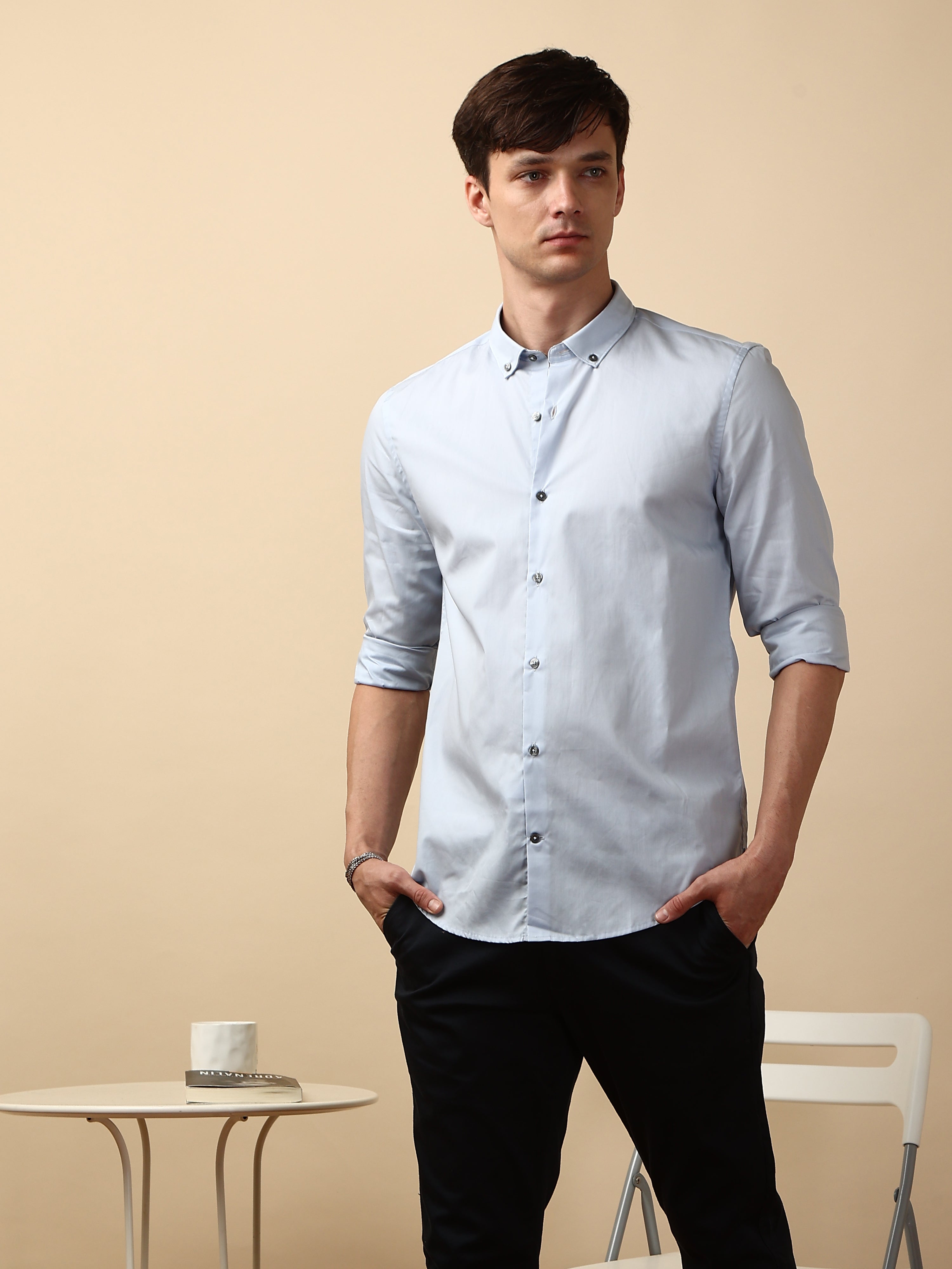 Snow Blue Semi casual full sleeve shirt shop online at Estilocus. • Full-sleeve solid shirt• Cut and sew placket• Regular collar• Double button square cuff.• Curved hemline• Finest quality sewing• Machine wash care• Suitable to wear with all types of bott