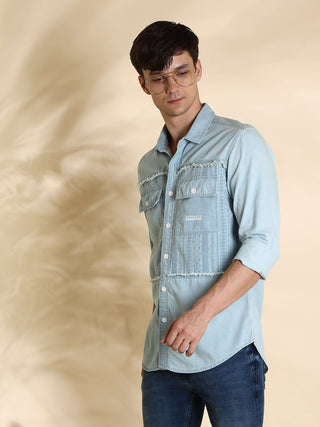 EST-Lt Blue cowboy Denim Double Pocket Shirt shop online at Estilocus. 100% premium Denim Denim ,Full-sleeve shirt cut and sew placket. Regular collar Double button edge cuff Double pocket with flap Curved bottom hemline pc-back elegant print @ panel All