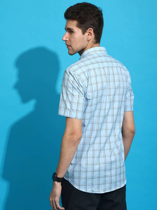 Light blue casual check half sleeves shirt shop online at Estilocus. • Half-sleeve check shirt• Cut and sew placket• Regular collar• Single pocket with logo embroidery• Curved hemline• Finest quality sewing• Machine wash care• Suitable to wear with all ty