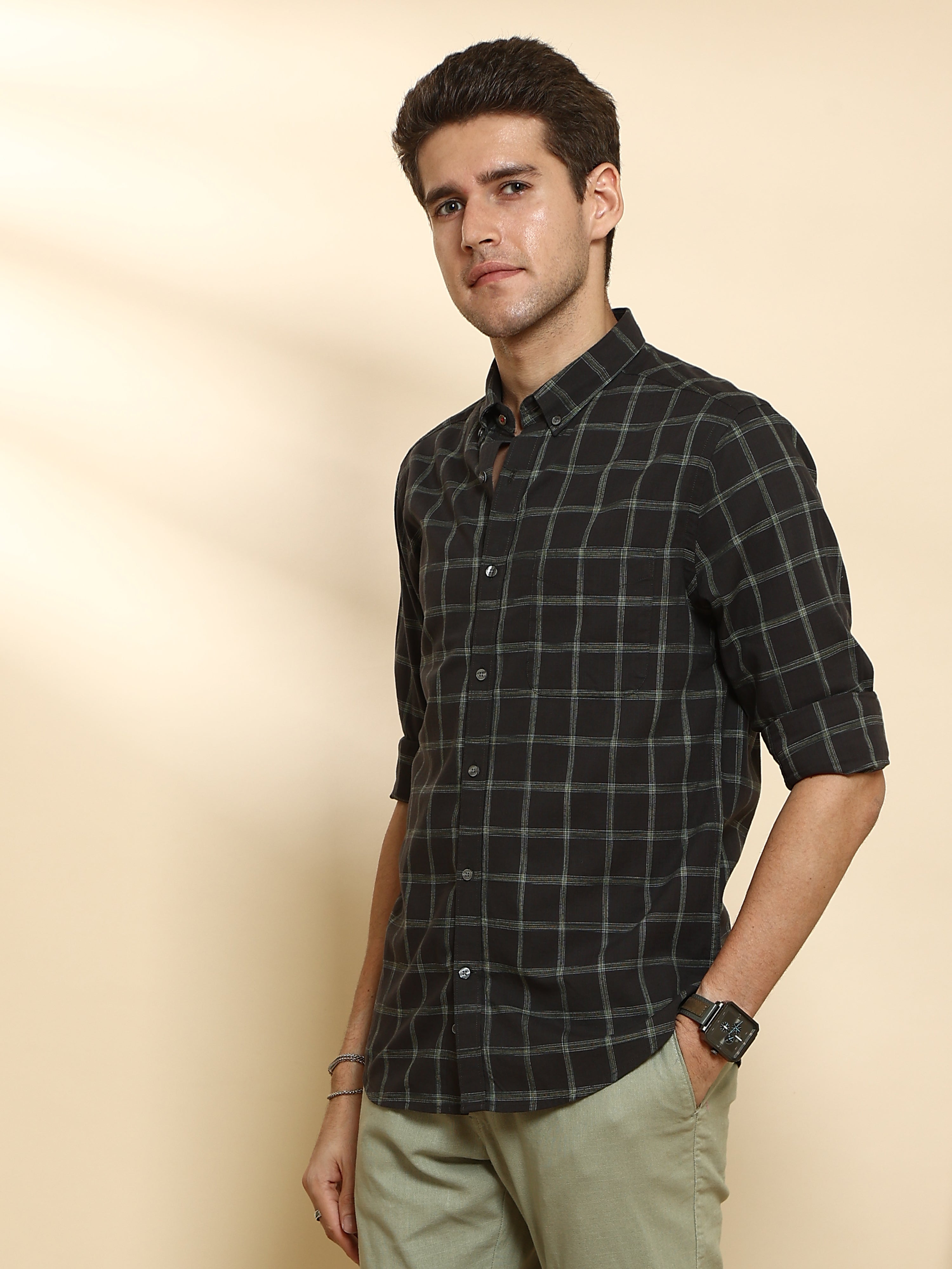 Dark Green Casual Full Sleeve Check Shirt shop online at Estilocus. • Full-sleeve check shirt• Cut and sew placket• Regular collar• Double button square cuff.• Single pocket with logo embroidery• Curved hemline• Finest quality sewing• Machine wash care• S