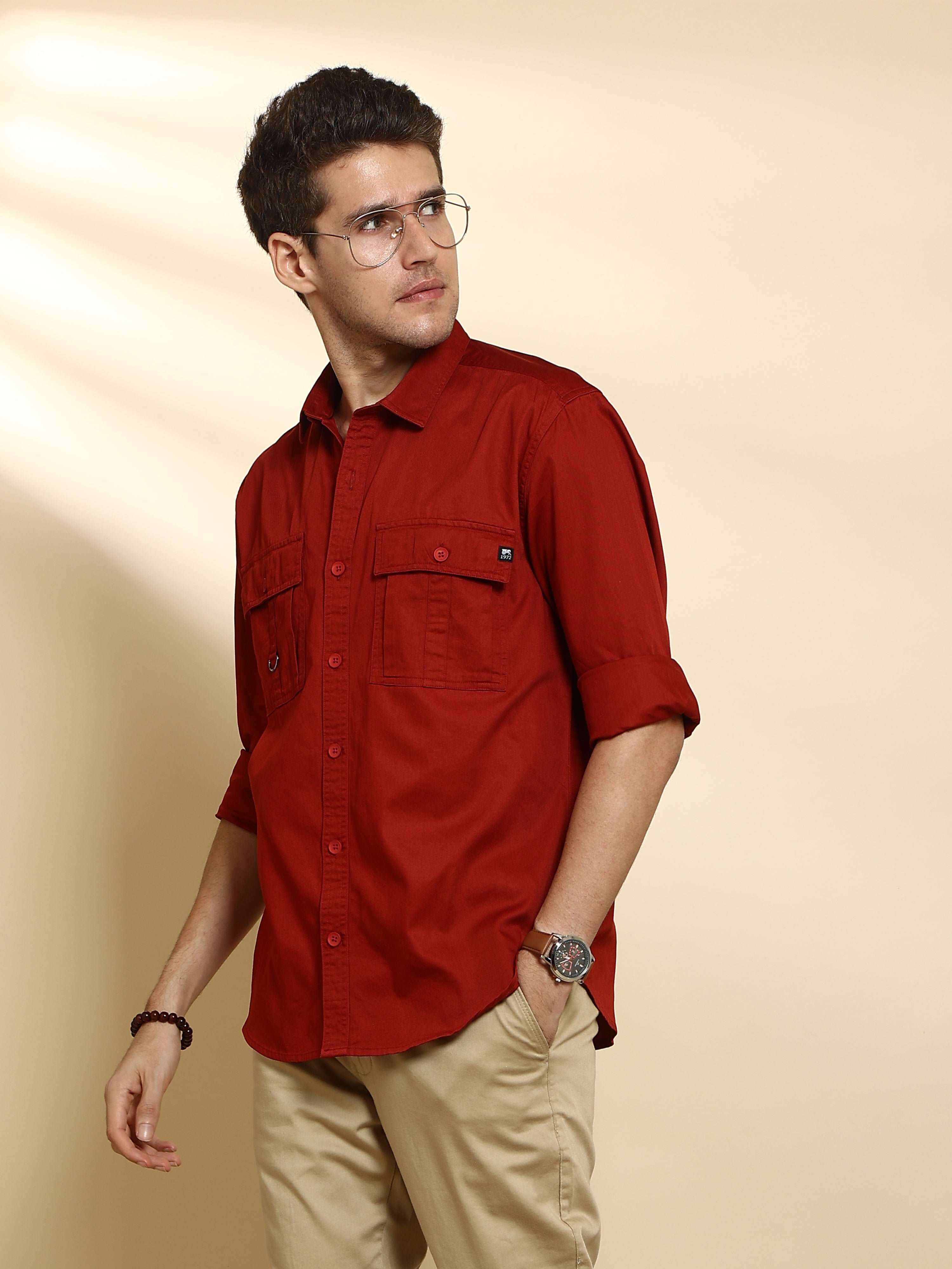 Brick Red Cargo casual full sleeve shirt shop online at Estilocus. • 100% PREMIUM COTTON • Full-sleeve solid shirt• Cut and sew placket• Regular collar• Double button round cuffs.• Double pocket with flap• Curved hemline• Finest quality sewing with all do