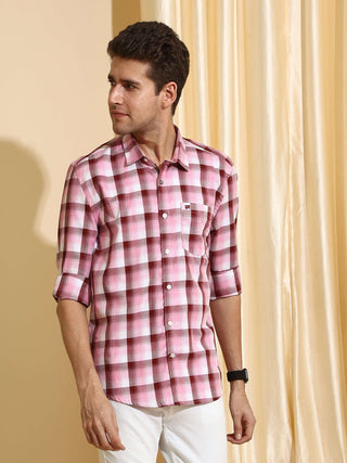 Pink check casual full sleeve shirt shop online at Estilocus. • 100% PREMIUM COTTON • Full-sleeve check shirt• Cut and sew placket• Regular collar• Double button square cuff.• Single pocket with logo embroidery• Curved hemline• Finest quality sewing with