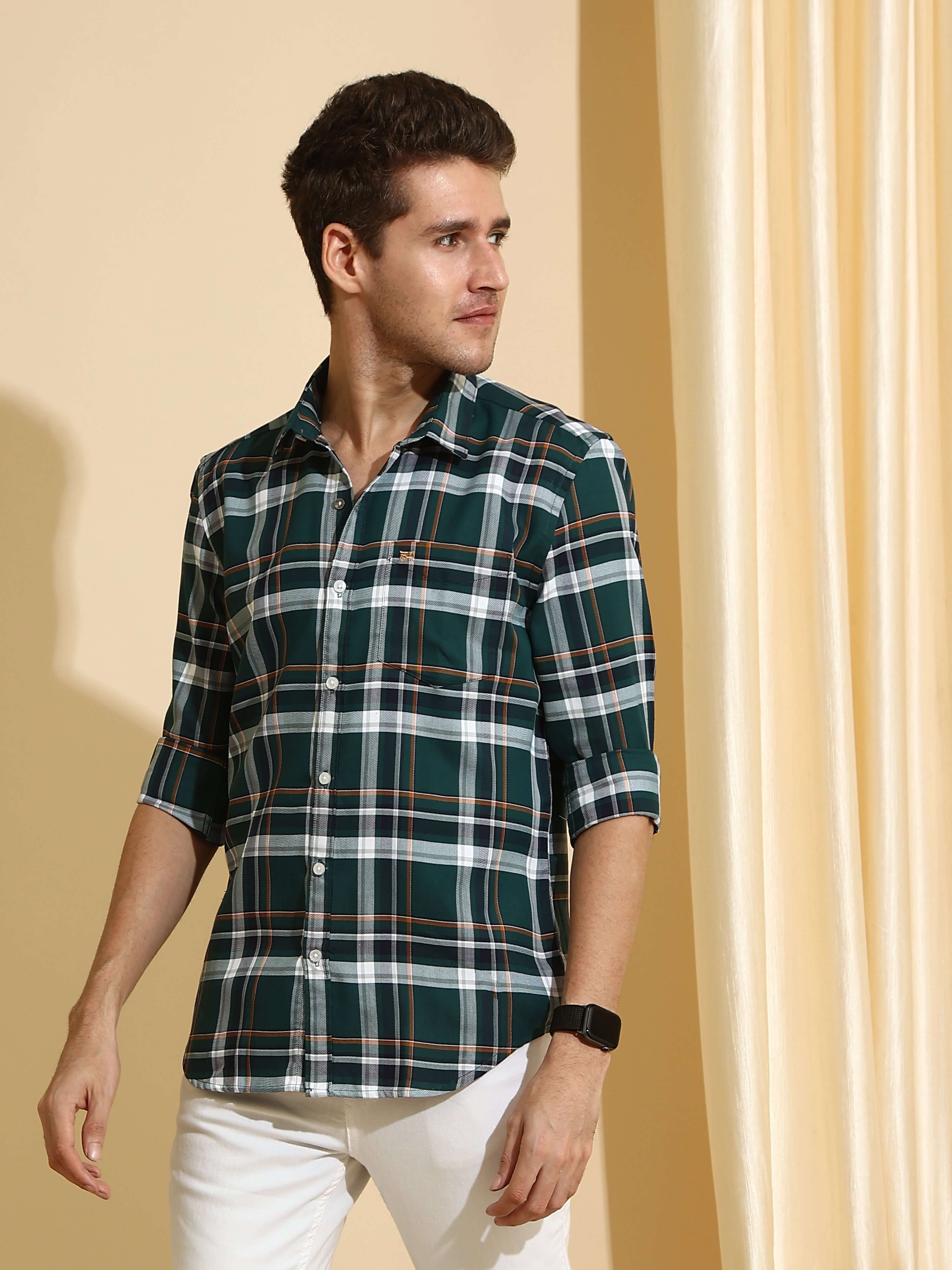 Teal & Green casual check full sleeves shirt shop online at Estilocus. • Full-sleeve shirt • Cut and sew placket • Regular collar • Double button square cuff. • Single pocket with logo embroidery • Curved hemline • All double-needle construction, finest q