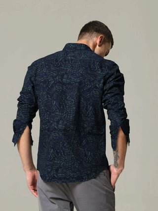 Indigo tribal tattoo printed full sleeve casual shirt shop online at Estilocus. • 100% PREMIUM INDIGO COTTON • Full-sleeve AOP shirt• Cut and sew placket• Regular collar• Double button square cuff.• Single pocket with logo embroidery• Curved hemline• Fine