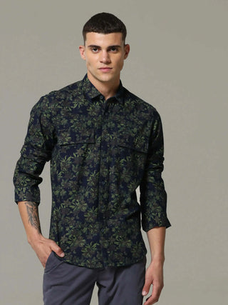 Indigo navy floral printed full sleeve casual shirt shop online at Estilocus. • 100% PREMIUM INDIGO COTTON • Full-sleeve solid shirt• Cut and sew placket• Regular collar• Double button square cuff.• Single pocket with logo embroidery• Curved hemline• Fine