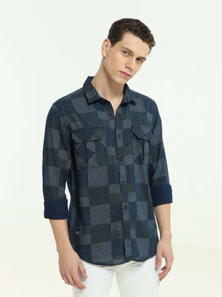 Denim multi blocked check casual shirt shop online at Estilocus. 100% Cotton • Full-sleeve check shirt• Cut and sew placket• Regular collar• Double button edge cuff • Double pocket with flap • Curved bottom hemline . • All double needle construction, fine