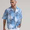 Blue Camp Oversized Shirt shop online at Estilocus. Our Blue Camp Oversized Shirt is perfect for those Hawaiian days. The relaxed fit and lightweight fabric make it comfortable to wear all day. Its classic style is perfect for those summer streetwear look