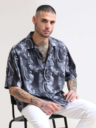 Baroquen Grey Oversized Shirt shop online at Estilocus. Our Baroquen Grey Oversized Shirt is perfect for those Hawaiian days. The relaxed fit and lightweight fabric make it comfortable to wear all day. Its classic style is perfect for those summer streetw