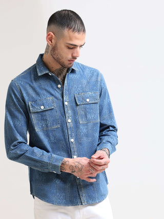 Floral Denim Double Pocket Shirt shop online at Estilocus. 100% premium Denim Denim ,Full-sleeve shirt cut and sew placket. Regular collar Double button edge cuff Double pocket with flap Curved bottom hemline pc-back elegant print @ panel All Double needl