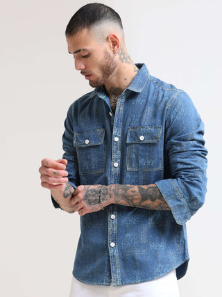 Floral Denim Double Pocket Shirt shop online at Estilocus. 100% premium Denim Denim ,Full-sleeve shirt cut and sew placket. Regular collar Double button edge cuff Double pocket with flap Curved bottom hemline pc-back elegant print @ panel All Double needl