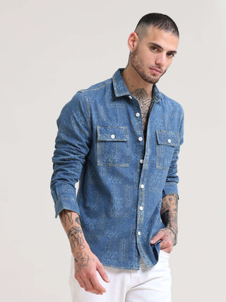 Floral Denim Double Pocket Shirt shop online at Estilocus. 100% premium Denim Denim ,Full-sleeve shirt cut and sew placket. Regular collar Double button edge cuff Double pocket with flap Curved bottom hemline pc-back elegant print @ panel All Double needl