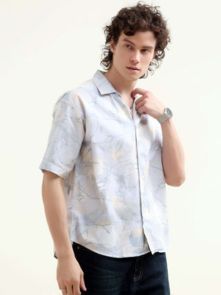 Mirajo Men's Dusky Blue Oversized Shirt shop online at Estilocus. Shop the new Mirajo oversized shirt for a breezy summer style. Light, airy, and perfect for casual days. Get your Hawaiian vibe on!