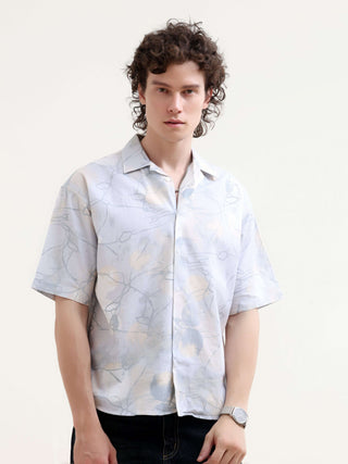 Mirajo Men's Dusky Blue Oversized Shirt shop online at Estilocus. Shop the new Mirajo oversized shirt for a breezy summer style. Light, airy, and perfect for casual days. Get your Hawaiian vibe on!