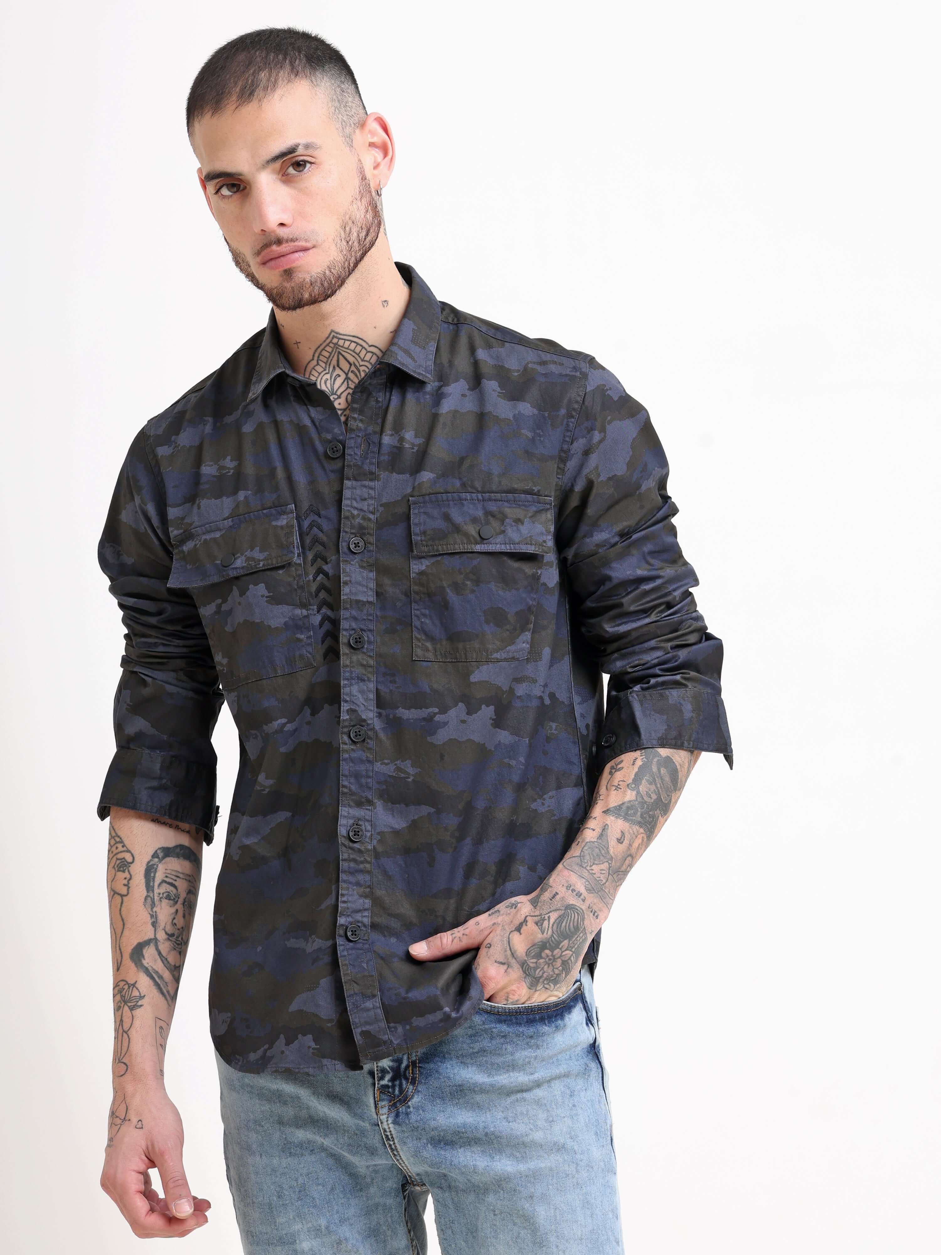 Army Navy Camo Cargo Shirt shop online at Estilocus. Boost your fashion quotient by donning this dark grey shirt from Estilocus. Made from cotton, this printed shirt is designed with full sleeves and a button-down collar. Pair this comfortable-fit shirt w