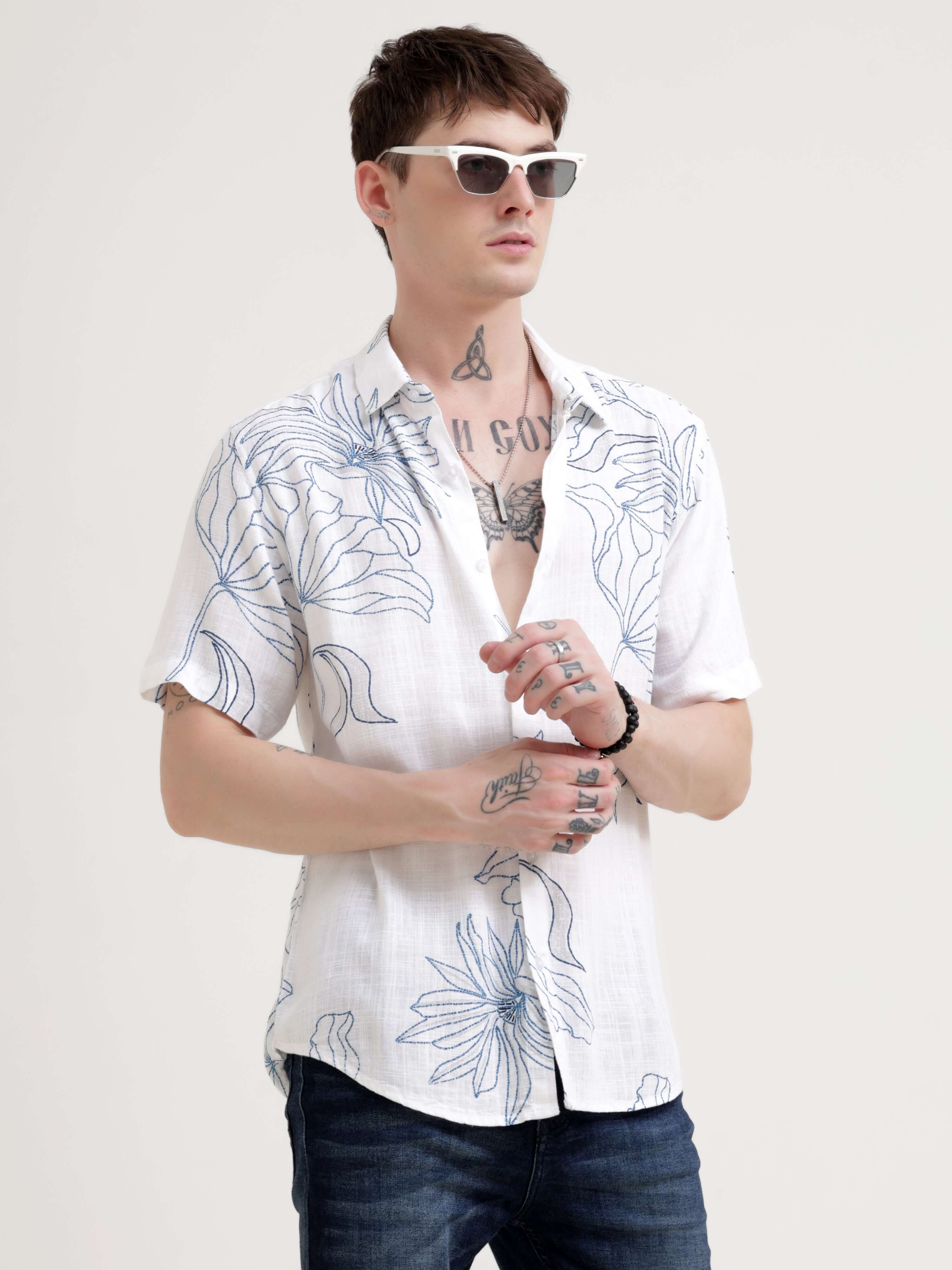 Floral printed blue half sleeve shirt - Men's Casual Wear shop online at Estilocus. Embrace the summer with our Floral printed blue half sleeve shirt. Perfect for Hawaiian days, its comfy & stylish fit makes it a streetwear favorite.