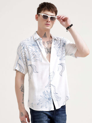 Floral printed blue half sleeve shirt - Men's Casual Wear shop online at Estilocus. Embrace the summer with our Floral printed blue half sleeve shirt. Perfect for Hawaiian days, its comfy & stylish fit makes it a streetwear favorite.