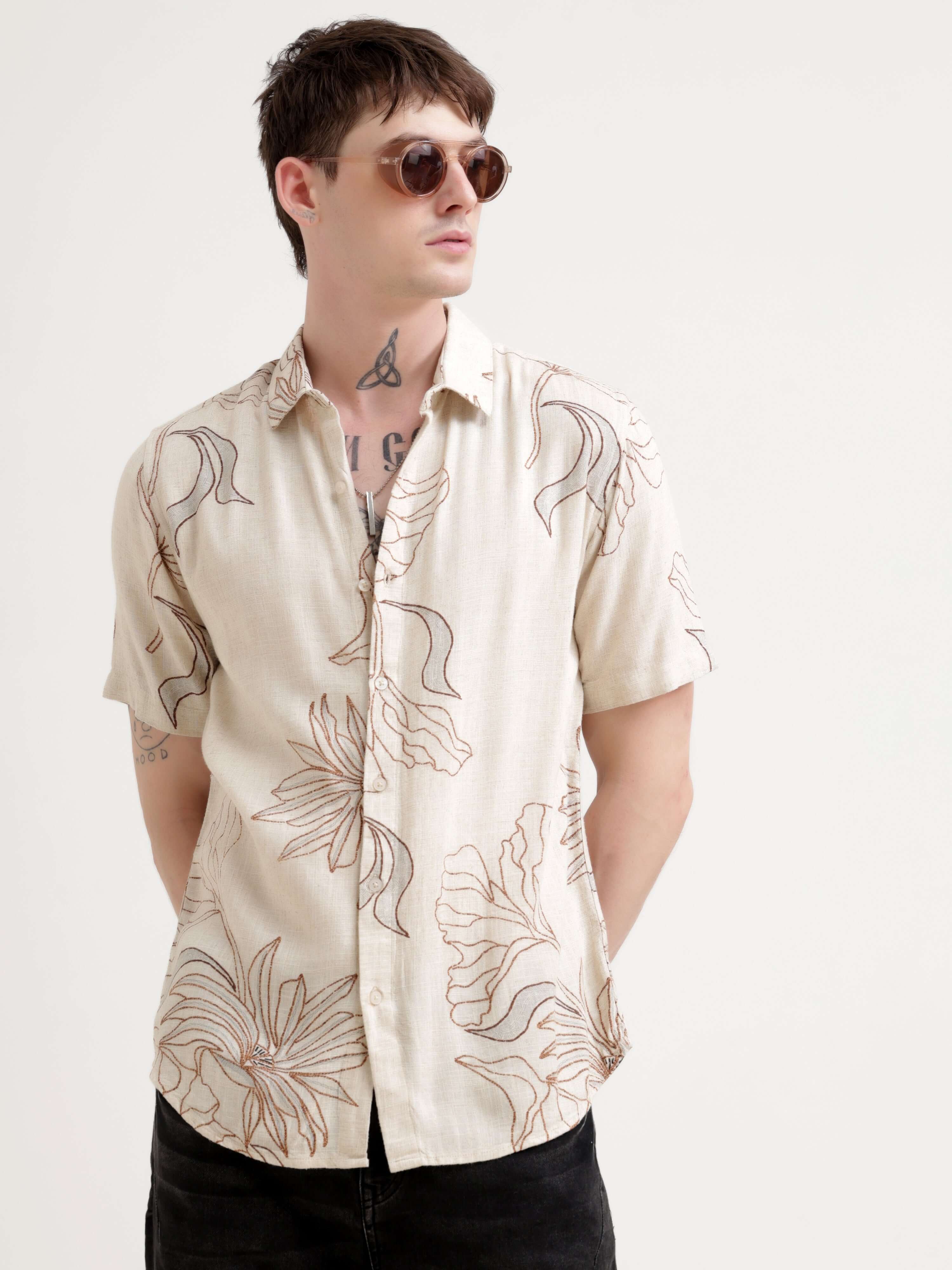 Floral printed beige half sleeve shirt - Men's Casual Wear shop online at Estilocus. Dive into summer with our Beige Floral Half Sleeve Shirt. Perfect for Hawaiian vibes & streetwear looks. Light, oversized & totally stylish!