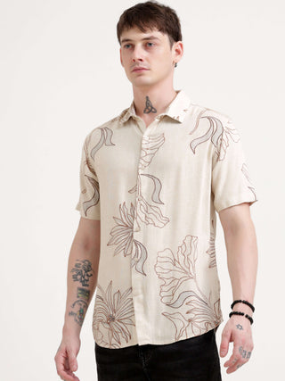 Floral printed beige half sleeve shirt - Men's Casual Wear shop online at Estilocus. Dive into summer with our Beige Floral Half Sleeve Shirt. Perfect for Hawaiian vibes & streetwear looks. Light, oversized & totally stylish!