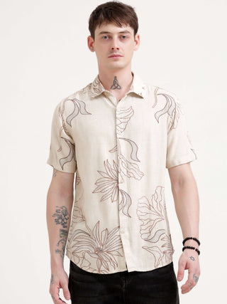 Floral printed beige half sleeve shirt - Men's Casual Wear shop online at Estilocus. Dive into summer with our Beige Floral Half Sleeve Shirt. Perfect for Hawaiian vibes & streetwear looks. Light, oversized & totally stylish!