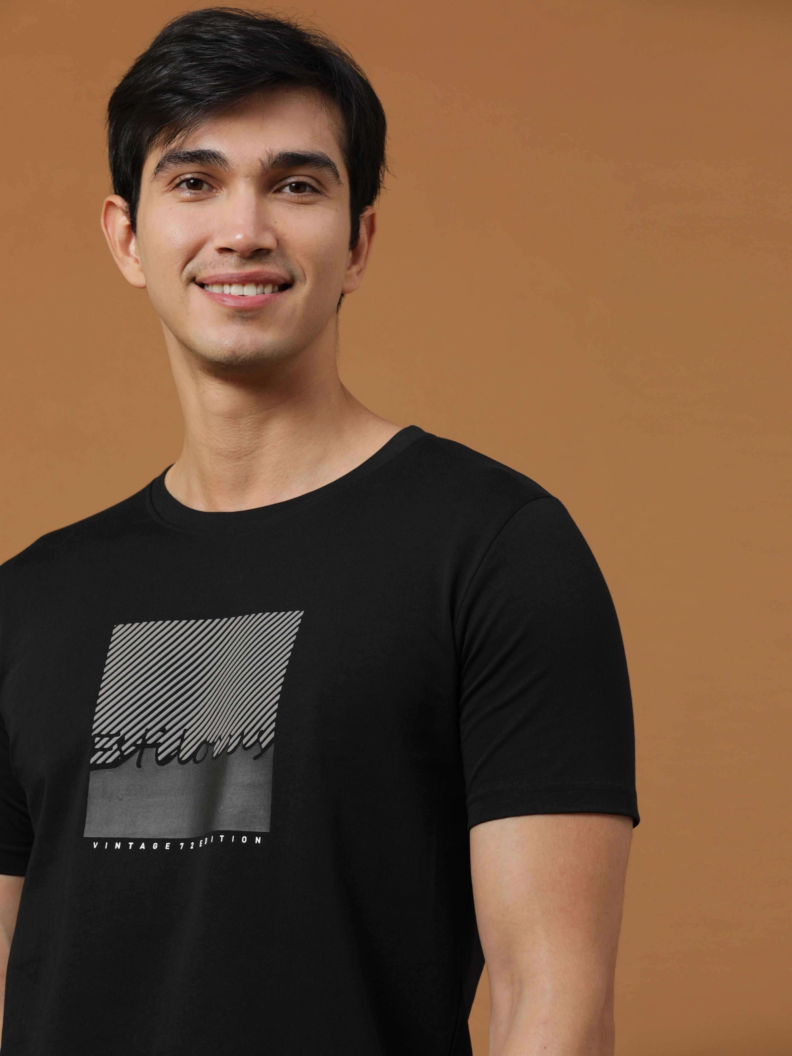 Black Vintage 72 Edition T Shirt shop online at Estilocus. 100% Cotton Designed and printed on knitted fabric. The fabric is stretchy and lightweight, with a soft skin feel and no wrinkles. Crew neck collar which is smooth on the neck and keeps you comfor
