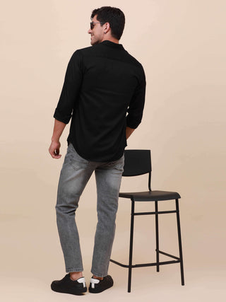 Black Solid Single Pocket full sleeve shirt shop online at Estilocus. 100% Cotton ,Full-sleeve solid shirt Cut and sew placket Regular collar Double button edge cuff Single pocket Curved bottom hemline Finest printing at front placket. All double needle c