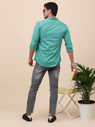 Aqua Marine Solid Single Pocket full sleeve Shirt shop online at Estilocus. 100% Cotton ,Full-sleeve solid shirt Cut and sew placket Regular collar Double button edge cuff Single pocket Curved bottom hemline Finest printing at front placket. All double ne