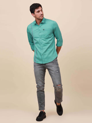 Aqua Marine Solid Single Pocket full sleeve Shirt shop online at Estilocus. 100% Cotton ,Full-sleeve solid shirt Cut and sew placket Regular collar Double button edge cuff Single pocket Curved bottom hemline Finest printing at front placket. All double ne