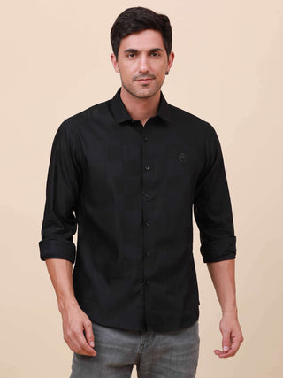 Black Check Pocketless Shirt shop online at Estilocus. 100% Cotton ,Full-sleeve checks shirt Self fold placket Regular collar Double button edge cuff Pocketless Curved bottom hemline Finest quality brand embroidery at front placket. All single needle cons