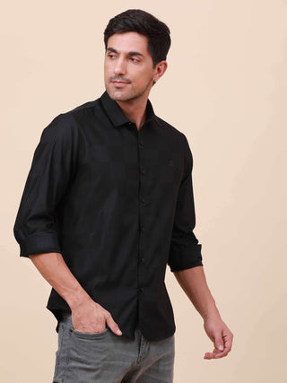 Black Check Pocketless Shirt shop online at Estilocus. 100% Cotton ,Full-sleeve checks shirt Self fold placket Regular collar Double button edge cuff Pocketless Curved bottom hemline Finest quality brand embroidery at front placket. All single needle cons