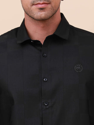 Black Check Pocketless Shirt shop online at Estilocus. 100% Cotton ,Full-sleeve checks shirt Self fold placket Regular collar Double button edge cuff Pocketless Curved bottom hemline Finest quality brand embroidery at front placket. All single needle cons