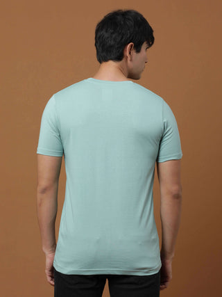 Aqua Luminescent Printed T Shirt shop online at Estilocus. 100% Cotton Designed and printed on knitted fabric. The fabric is stretchy and lightweight, with a soft skin feel and no wrinkles. Crew neck collar which is smooth on the neck and keeps you comfor