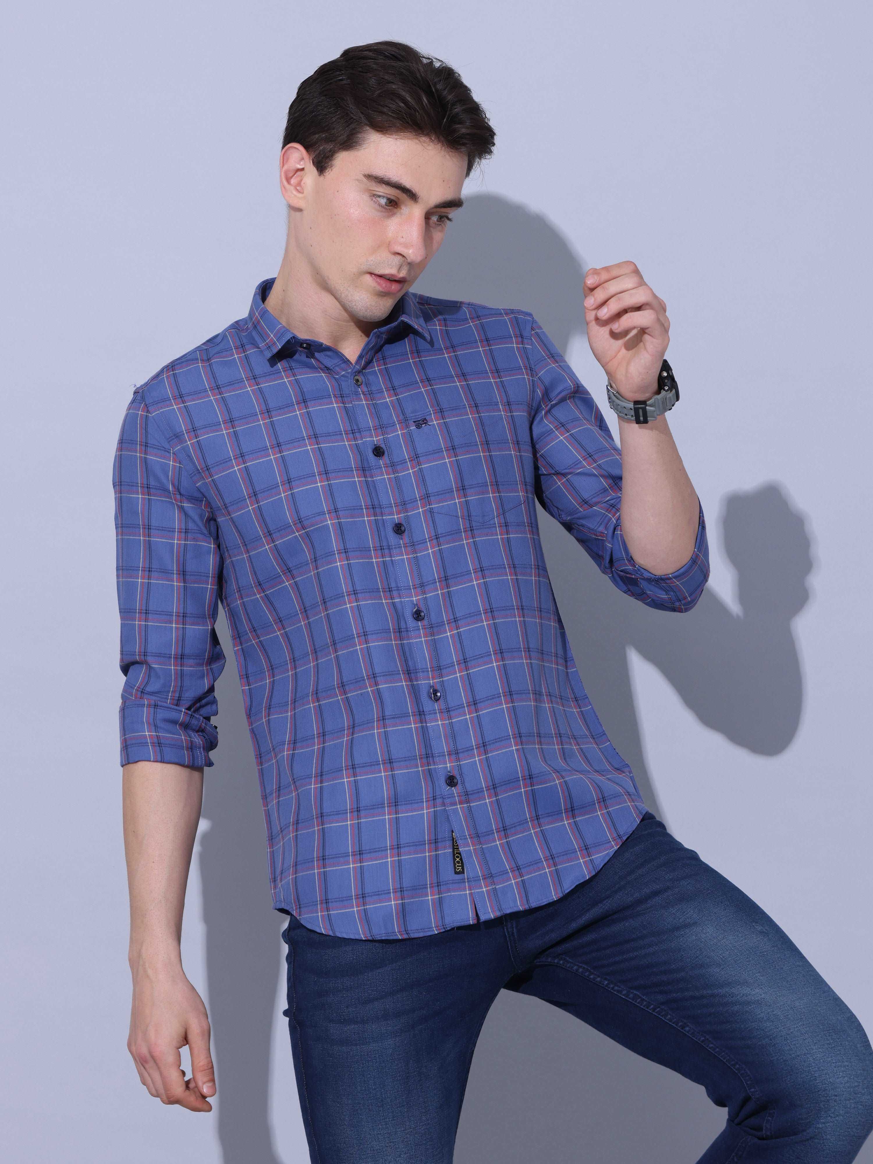 Blue Check Full Sleeve Casual Shirt shop online at Estilocus. • Full-sleeve check shirt with regular collar • Double button square cuff • Single pocket with logo embroidery • Curved hemline • Finest quality sewing • Machine wash care • Suitable to wear wi