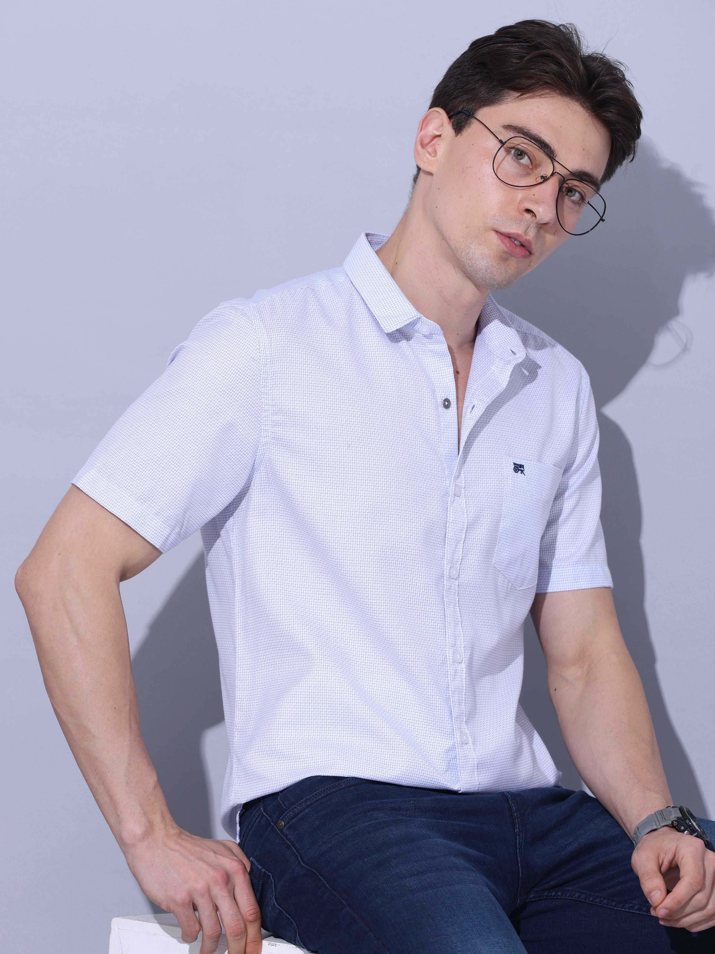 Blue Casual Half Sleeve Shirt shop online at Estilocus. • Half-sleeve printed shirt • Cut and sew placket • Regular collar • Single pocket with logo embroidery • Curved hemline • Finest quality sewing • Machine wash care • Suitable to wear with all types
