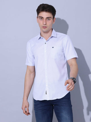 Blue Casual Half Sleeve Shirt shop online at Estilocus. • Half-sleeve printed shirt • Cut and sew placket • Regular collar • Single pocket with logo embroidery • Curved hemline • Finest quality sewing • Machine wash care • Suitable to wear with all types