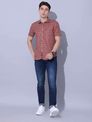 Bricks Check Casual Half Sleeve Shirt shop online at Estilocus. • Half-sleeve check shirt • Cut and sew placket • Regular collar • Single pocket with logo embroidery • Curved hemline • Finest quality sewing • Machine wash care • Suitable to wear with all