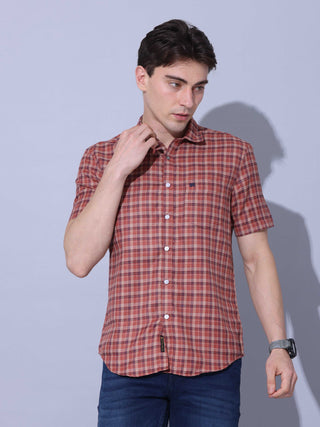 Bricks Check Casual Half Sleeve Shirt shop online at Estilocus. • Half-sleeve check shirt • Cut and sew placket • Regular collar • Single pocket with logo embroidery • Curved hemline • Finest quality sewing • Machine wash care • Suitable to wear with all