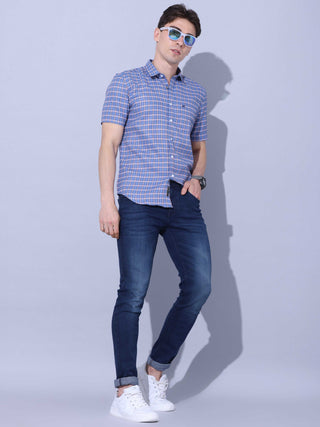 Blue Check Casual half sleeve Shirt shop online at Estilocus. • This blue checkered full sleeve shirt is a perfect addition to any man's wardrobe • Cut and sew placket • Regular collar • Single pocket with logo embroidery • Curved hemline • Finest quality