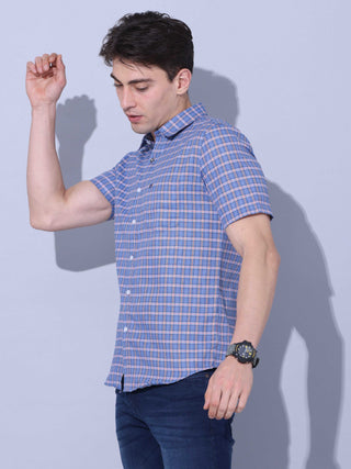 Blue Check Casual half sleeve Shirt shop online at Estilocus. • This blue checkered full sleeve shirt is a perfect addition to any man's wardrobe • Cut and sew placket • Regular collar • Single pocket with logo embroidery • Curved hemline • Finest quality