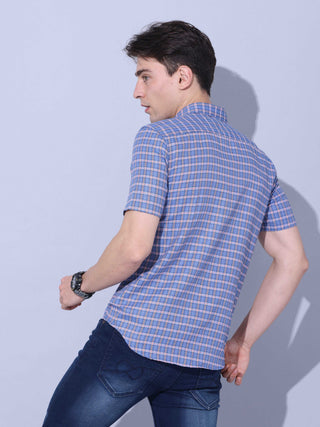 Blue Check Casual half sleeve Shirt shop online at Estilocus. • This blue checkered full sleeve shirt is a perfect addition to any man's wardrobe • Cut and sew placket • Regular collar • Single pocket with logo embroidery • Curved hemline • Finest quality