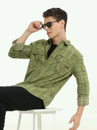 Olive green Check double pocket shirt shop online at Estilocus. 100% Cotton • Full-sleeve check shirt• Cut and sew placket• Regular collar• Double button edge cuff• Double pocket with flap• Curved bottom hemline .• All double needle construction, finest q