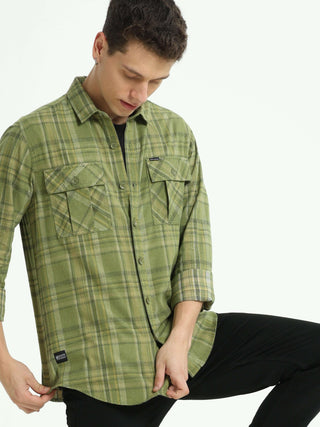 Olive green Check double pocket shirt shop online at Estilocus. 100% Cotton • Full-sleeve check shirt• Cut and sew placket• Regular collar• Double button edge cuff• Double pocket with flap• Curved bottom hemline .• All double needle construction, finest q