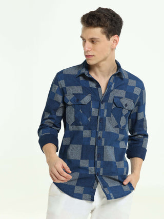 Lt Denim multi blocked check shirt shop online at Estilocus. 100% Cotton • Full-sleeve check shirt• Cut and sew placket• Regular collar• Double button edge cuff • Double pocket with flap • Curved bottom hemline . • All double needle construction, finest q