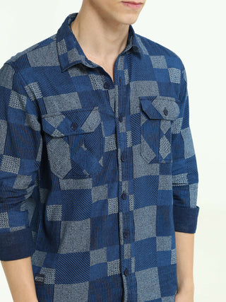 Lt Denim multi blocked check shirt shop online at Estilocus. 100% Cotton • Full-sleeve check shirt• Cut and sew placket• Regular collar• Double button edge cuff • Double pocket with flap • Curved bottom hemline . • All double needle construction, finest q