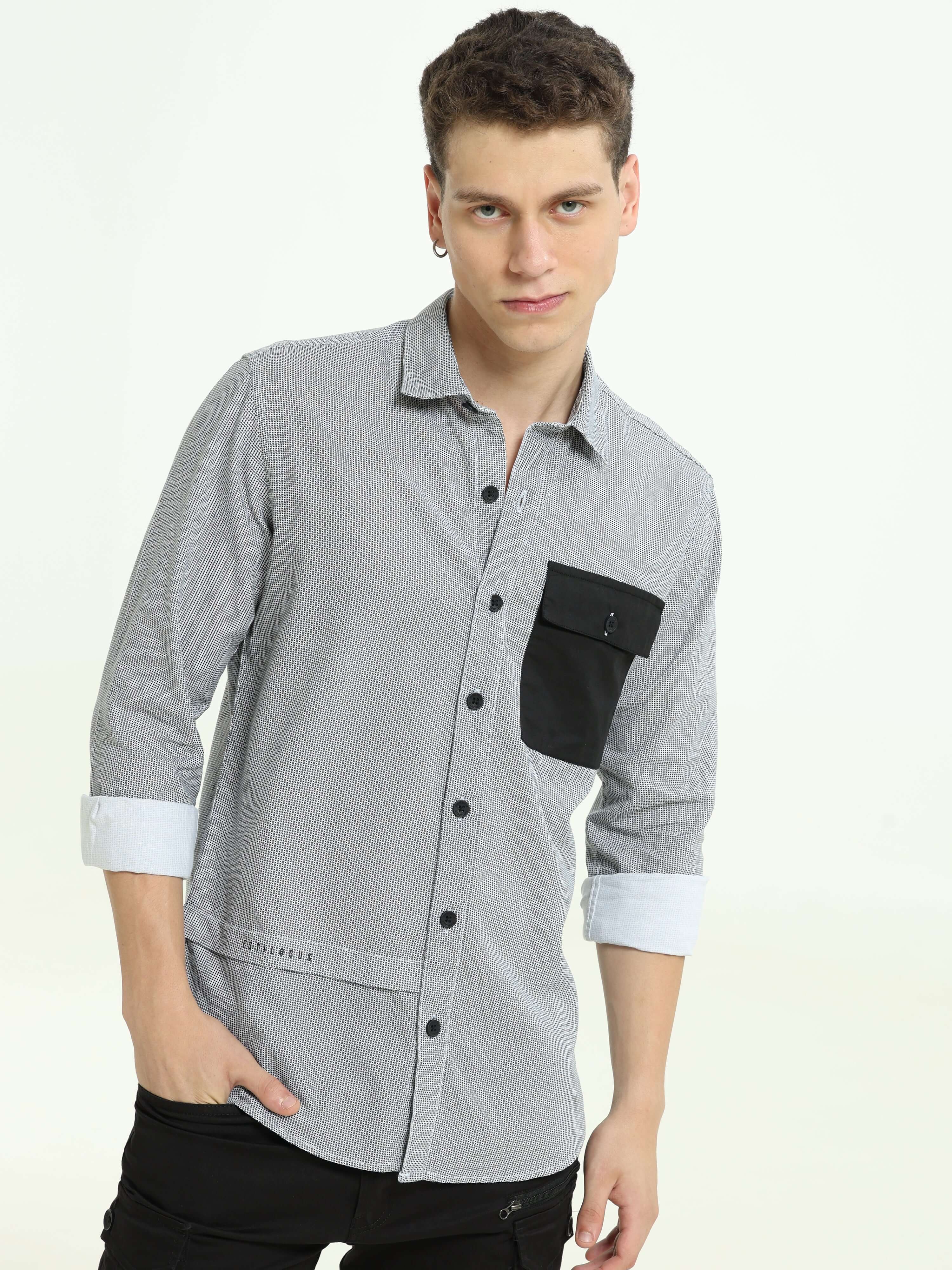 Grey contrast patch solid shirt shop online at Estilocus. • Full-sleeve solid grey shirt• Cut and sew placket• Regular collar• Double button square cuff.• Single pocket with logo embroidery• Curved hemline• All double-needle construction, finest quality s